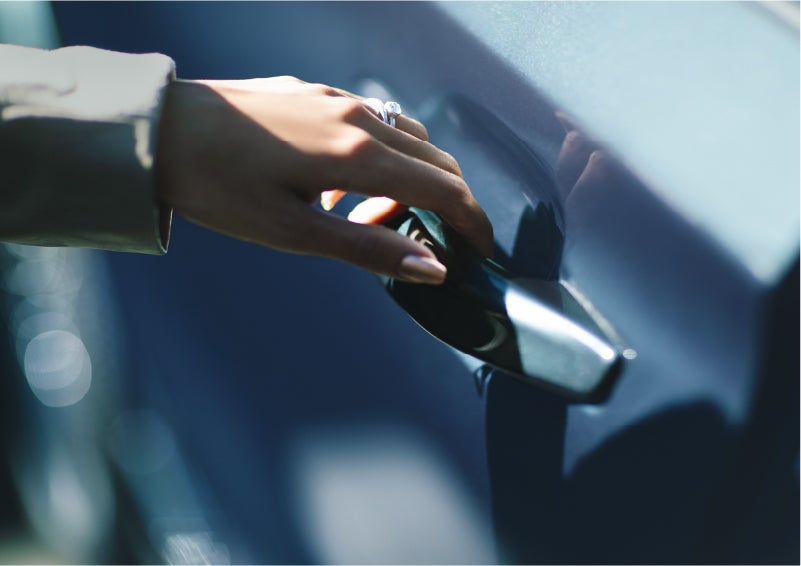 A hand gracefully grips the Light Touch Handle of a 2023 Lincoln Aviator® SUV to demonstrate its ease of use | Don Franklin Lincoln Elizabethtown in Elizabethtown KY