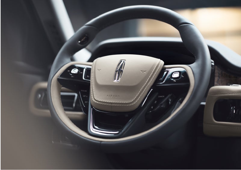 The intuitively placed controls of the steering wheel on a 2023 Lincoln Aviator® SUV | Don Franklin Lincoln Elizabethtown in Elizabethtown KY