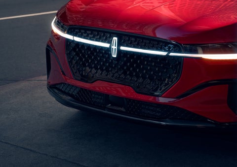 The available front LED light bar and center Lincoln Star logo glow at dusk. | Don Franklin Lincoln Elizabethtown in Elizabethtown KY
