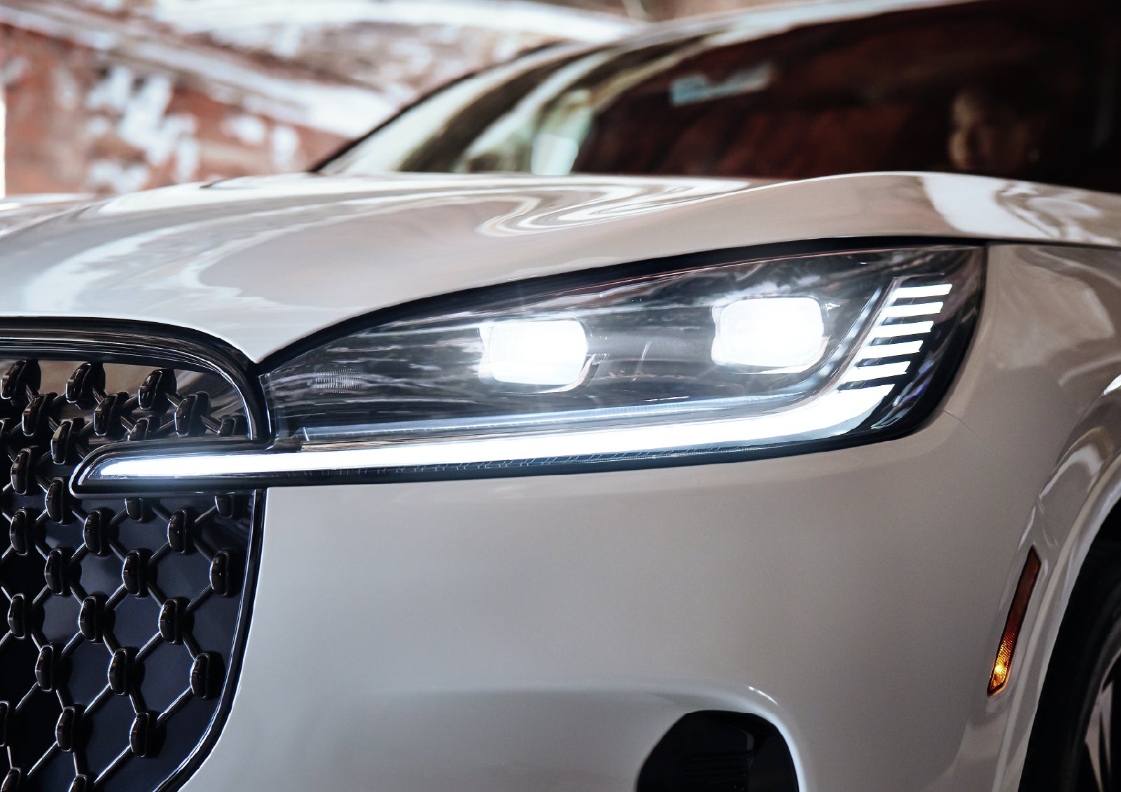 A close-up of a headlamp on the 2027 Lincoln Aviator® SUV is shown. | Don Franklin Lincoln Elizabethtown in Elizabethtown KY
