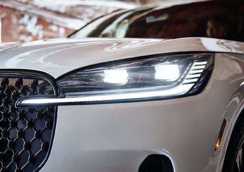 A close-up of a headlamp on the 2027 Lincoln Aviator® SUV is shown. | Don Franklin Lincoln Elizabethtown in Elizabethtown KY