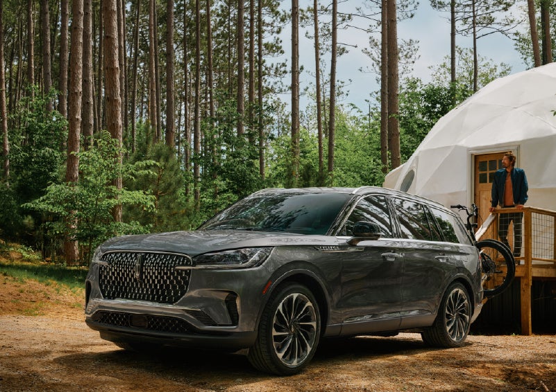 A 2027 Lincoln Aviator® is parked next to a high end glamping site. | Don Franklin Lincoln Elizabethtown in Elizabethtown KY