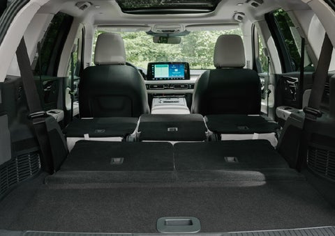 A rear to front view of the interior of a 2027 Lincoln Aviator® Black Label™ SUV shows the third and second rows folded flat | Don Franklin Lincoln Elizabethtown in Elizabethtown KY