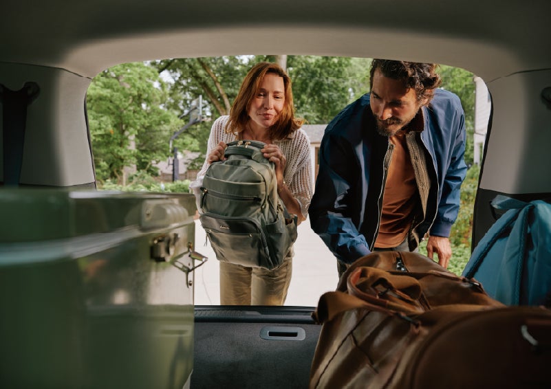 A couple loads luggage into the rear of a 2027 Lincoln Aviator® Black Label™ SUV..e 202 | Don Franklin Lincoln Elizabethtown in Elizabethtown KY